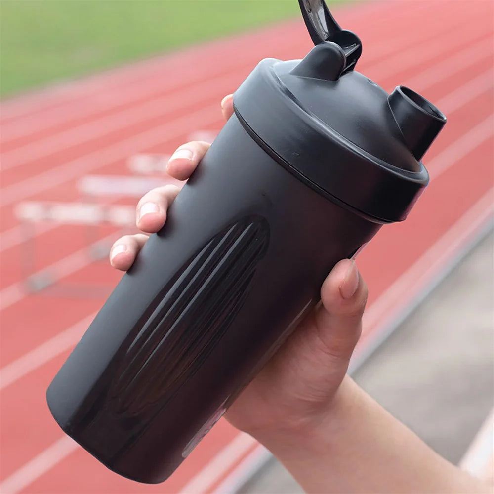 Shaker Garrafa 600ml – Praticidade e Performance para Sua Rotina Fitness